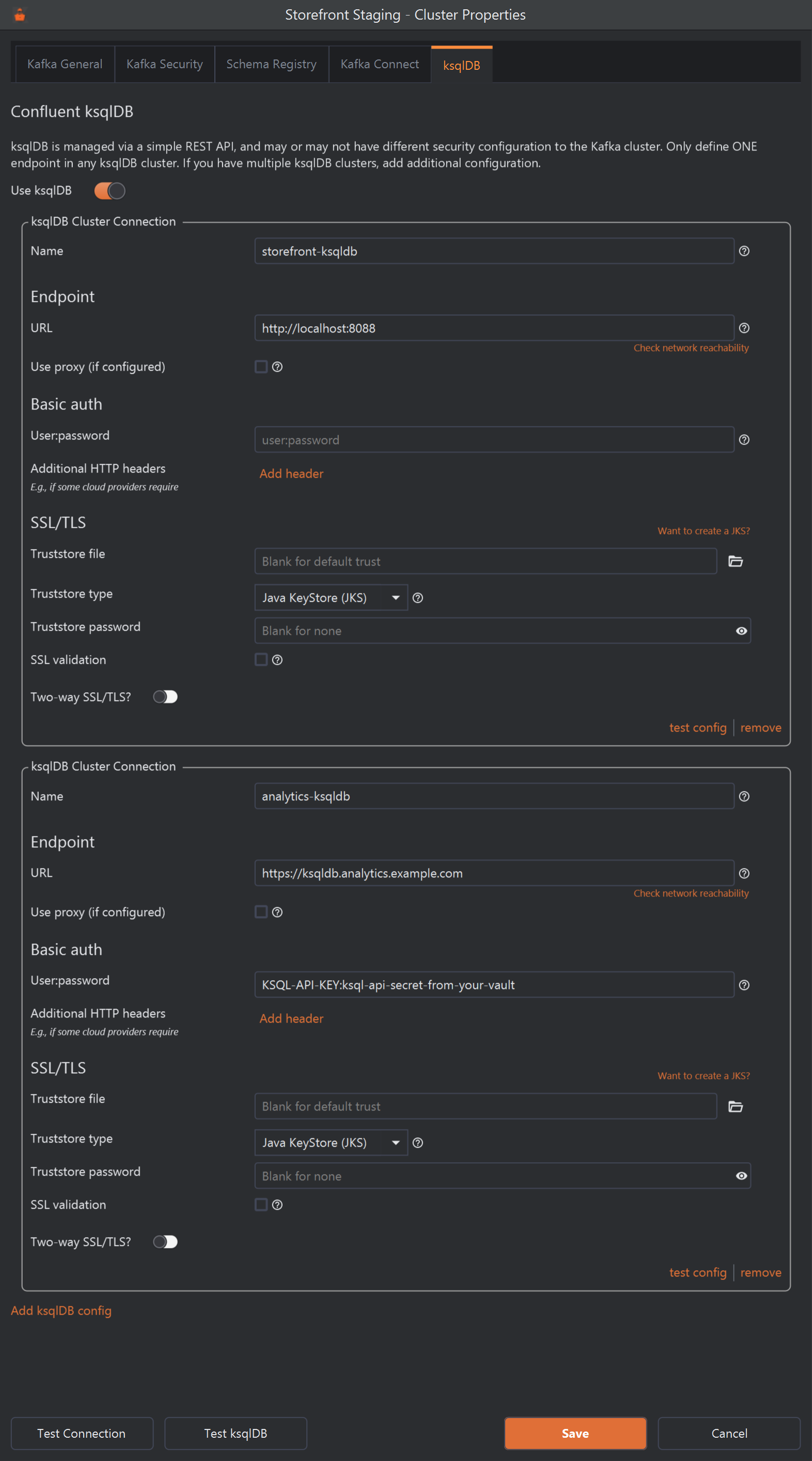 A second ksqlDB Cluster Connection box on the same tab. Name is analytics-ksqldb, URL https://ksqldb.analytics.example.com with no port, and User:password KSQL-API-KEY:ksql-api-secret-from-your-vault. Below the box's SSL/TLS settings are test config and remove links, then an Add ksqlDB config link. At the bottom of the dialog are Test Connection, Test ksqlDB, Save and Cancel.