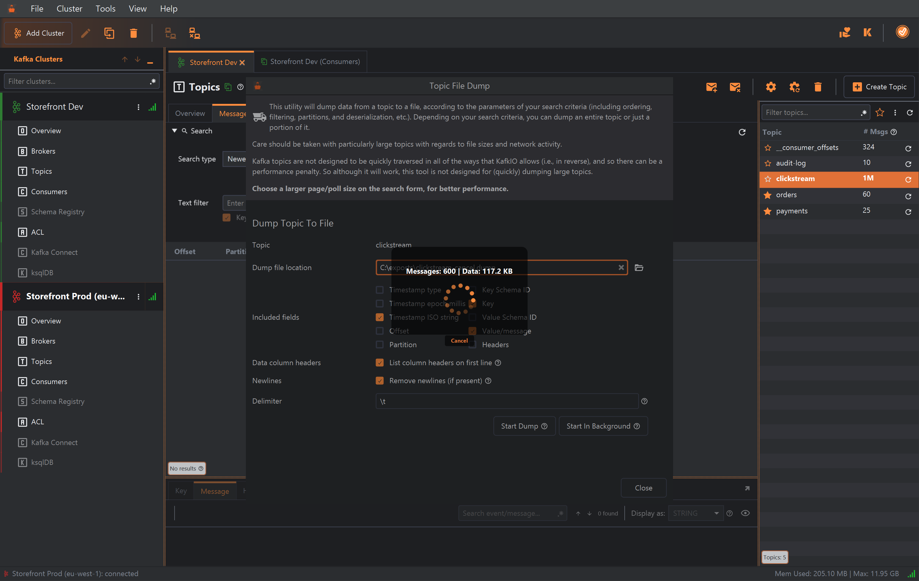The Topic File Dump dialog for the clickstream topic, dimmed under a progress message reading Messages: 600 | Data: 117.2 KB, with a spinner and a Cancel link below it.
